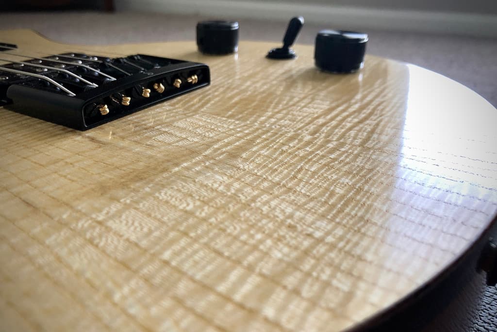 Single Cut, curly Hackberry top