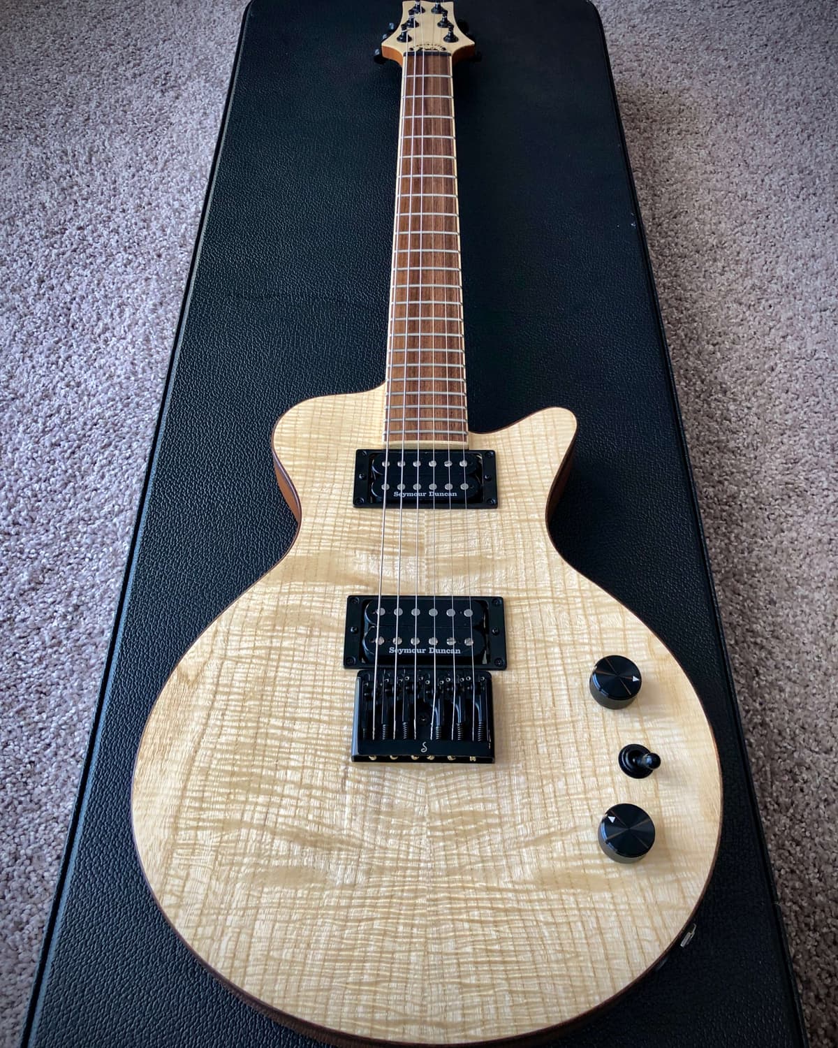 Single Cut, curly Hackberry top